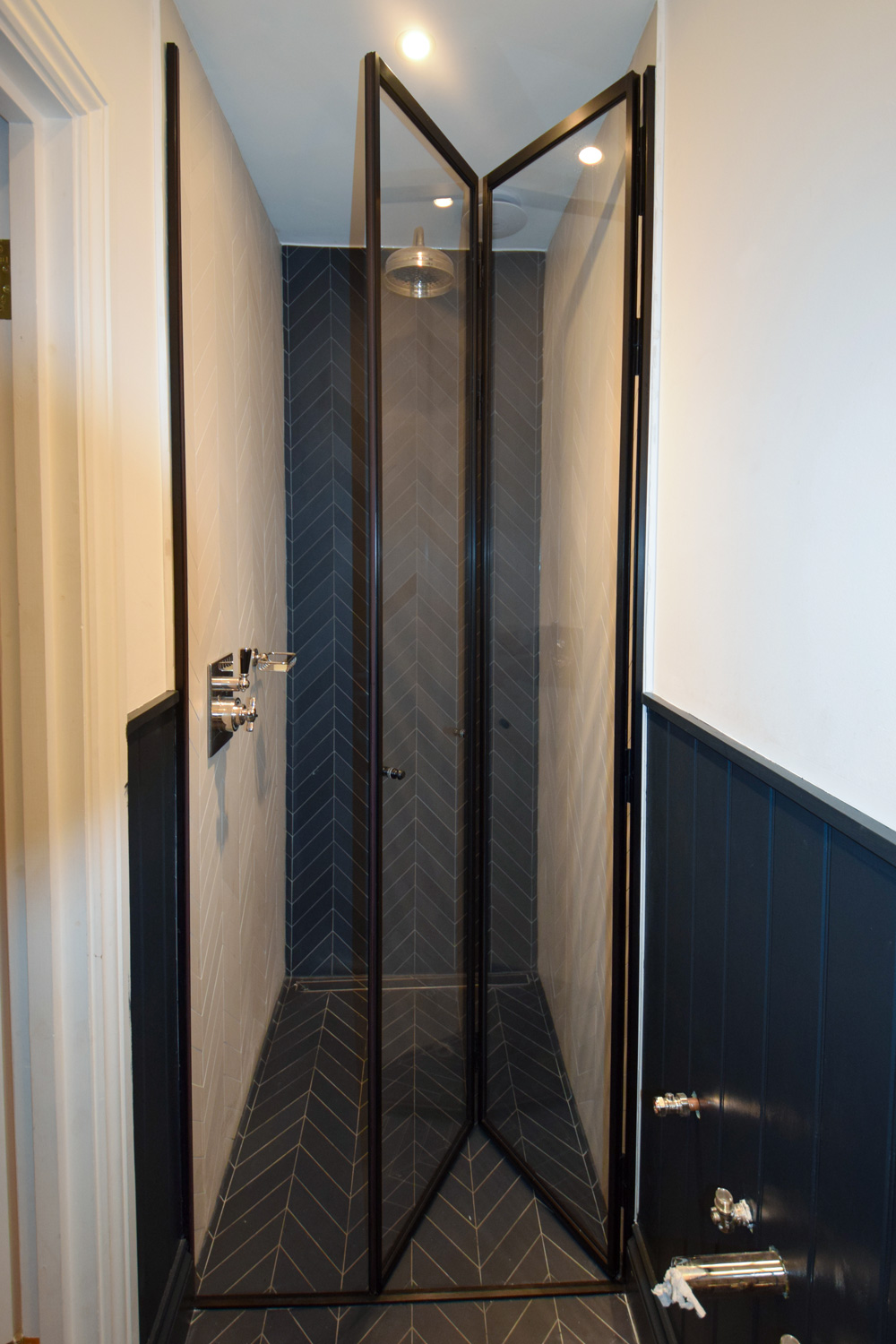 black frame bi-fold shower doors